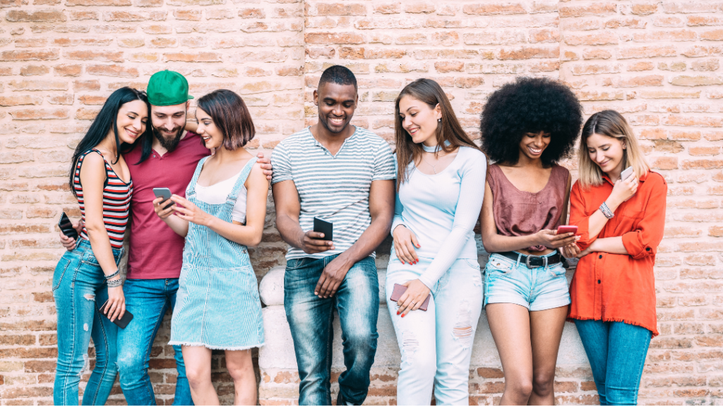 A group of Gen Z-ers on their phones.