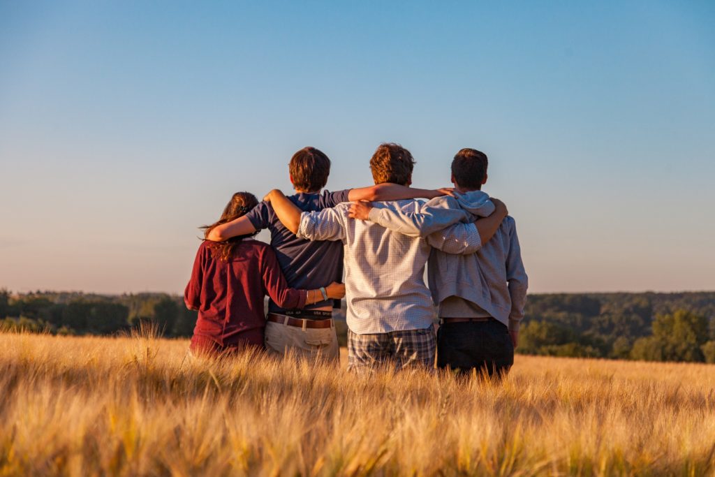 Group of young people looking off into the distance